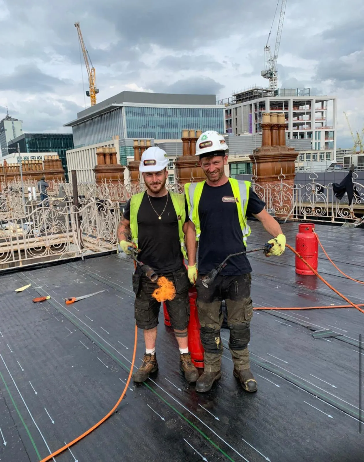 Re-roofing a live Manchester landmark — flat roofing the Midland Hotel. 16