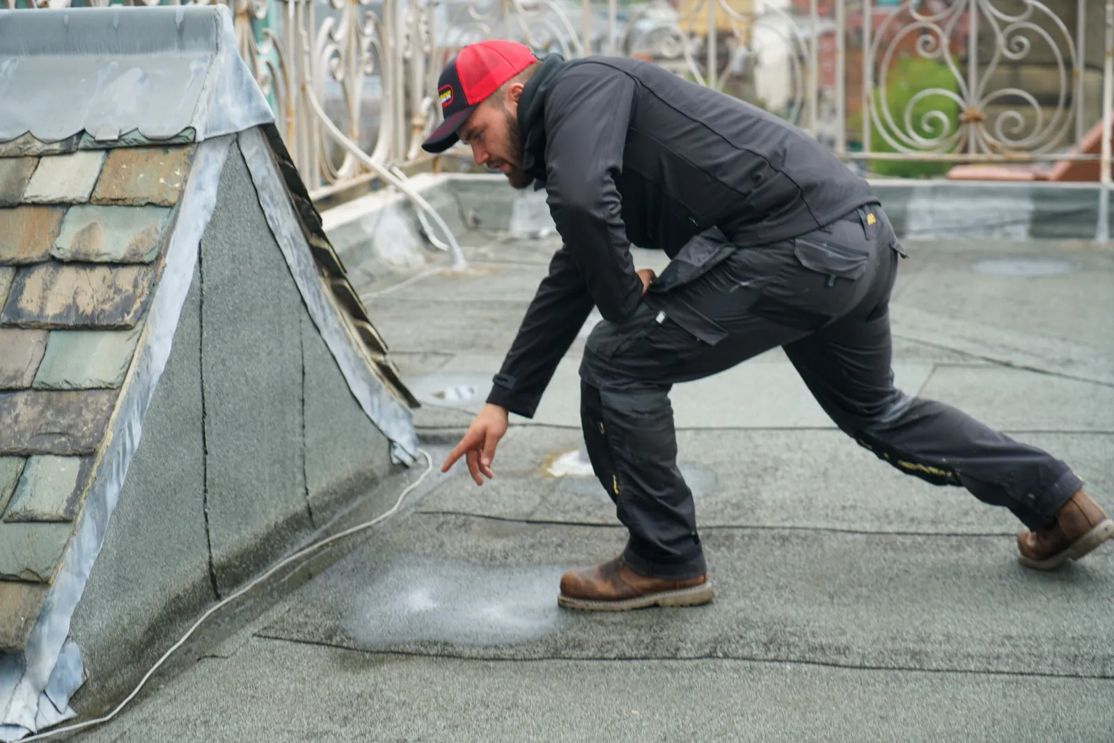 Ronald G Graham roofer at work on the Midland Hotel roof, Manchester